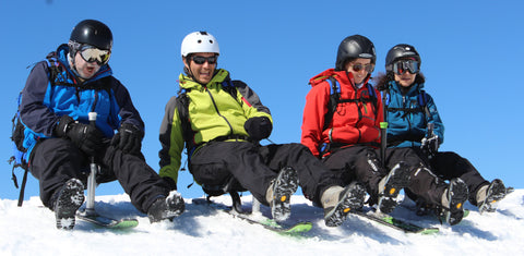 Group of adults starting out on a Snooc sled with energy