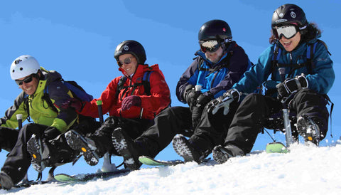 Group starting out in ski sledding