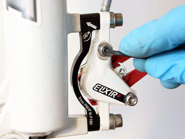 removing bleed port screw from avid elixir brake calliper