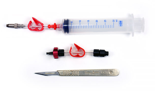 sram bleed syringe bleeding edge adapter and scalpel knife