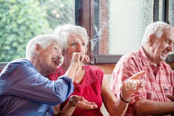 laughing smoking group of elderly | 6 Ways Cannabis Shows Promise To Relieve Chronic Disease In Seniors | Blumenes CBD Blog