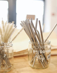 A collection of metal straws 