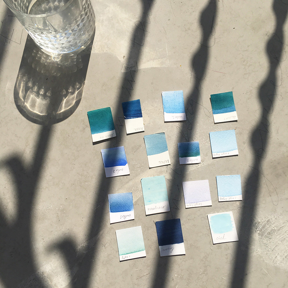 PPainting color swatches on the balcony by Marta Grossi.