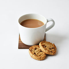 Why do the British dunk biscuits in tea?