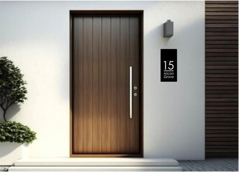 Modern front door with portrait rectangular laser cut house sign