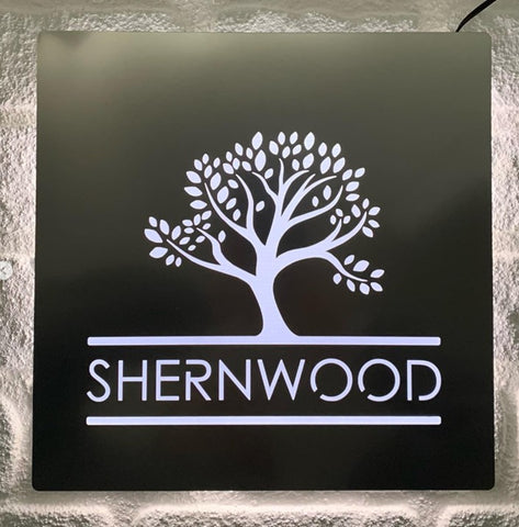 Steel effect illuminated house sign with tree logo
