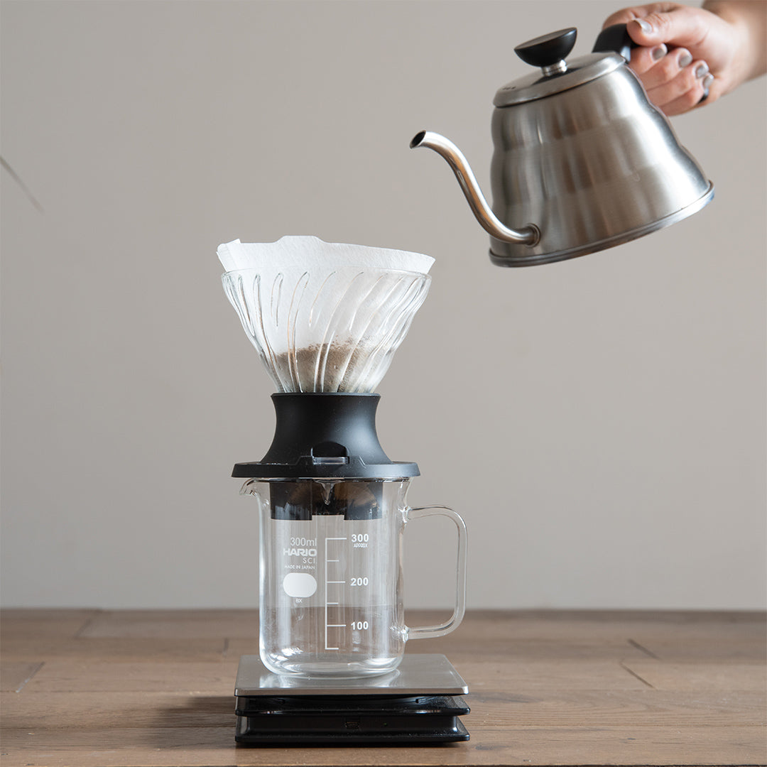 Osmotic flow method of coffee brewing