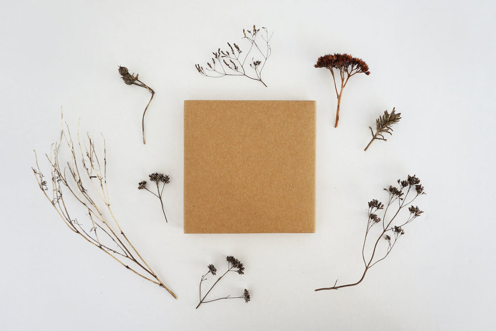 brown paper gift and dried flowers