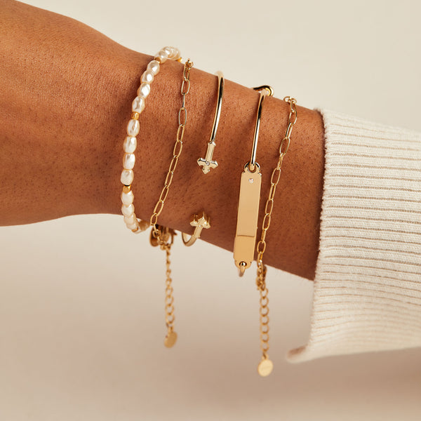 layered gold bracelets