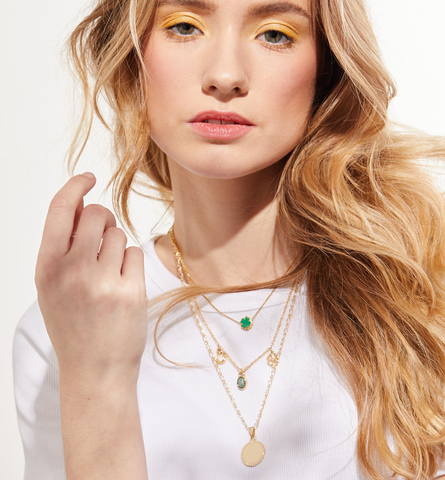 four-leaf clover layered necklaces on model