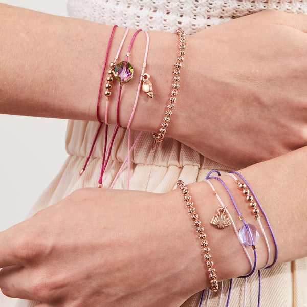 purple and pink seashell thread bracelet set for summer