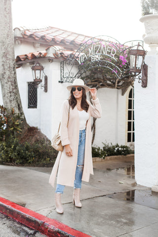 dark hair with white neutral outfit