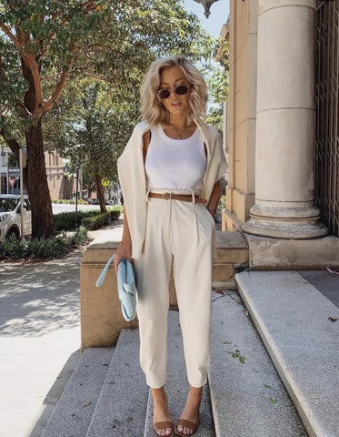 blonde looks great with neutral cream outfit