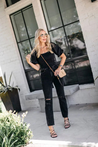 blonde hair contrasting black outfit