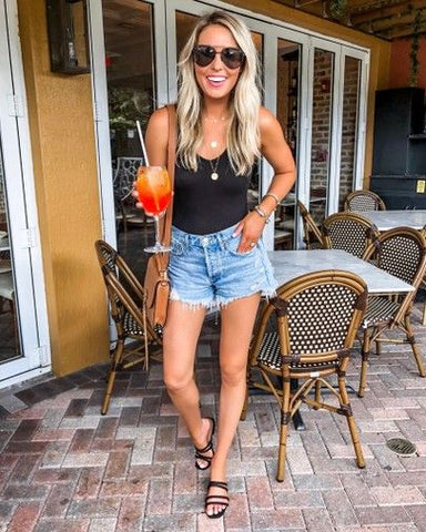 denim shorts and sandals summer outfit