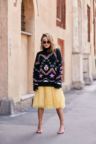 yellow skirt chunky sweater maximalist outfit
