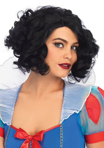 full-bodied curly black chin length bob wig with off-center part, shown on model