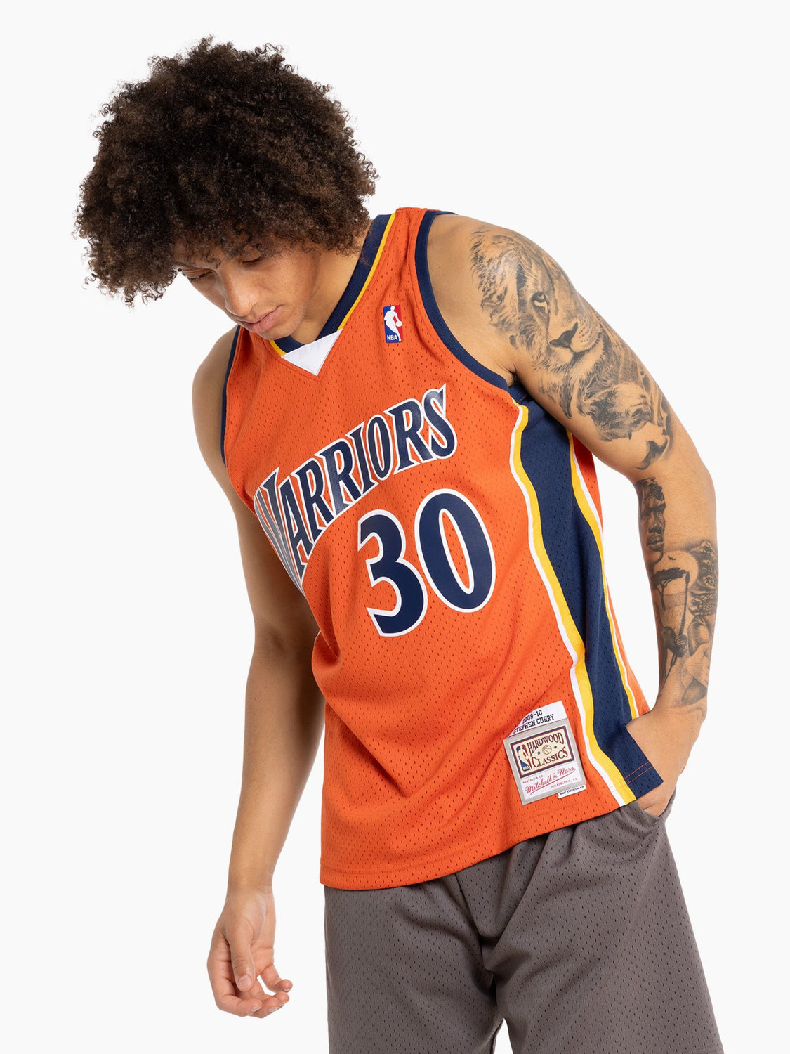 Mitchell & Ness NBA SWINGMAN JERSEY GOLDEN STATE WARRIORS ALTERNATE 2009-10 STEPHEN CURRY #30 men Jerseys orange in size:XL