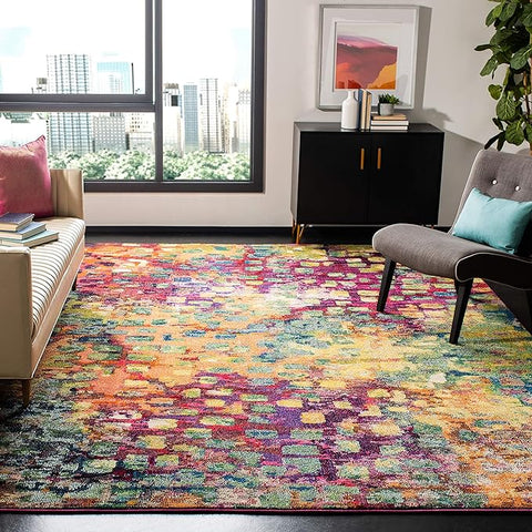 Pink and multi-colored area rug featuring a stylish abstract watercolor design, perfect for adding boho chic flair to any room.