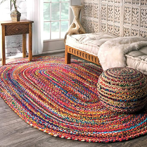Vibrant multi-color bohemian hand-braided area rug, oval 5x8 size, made of 100% cotton in India.