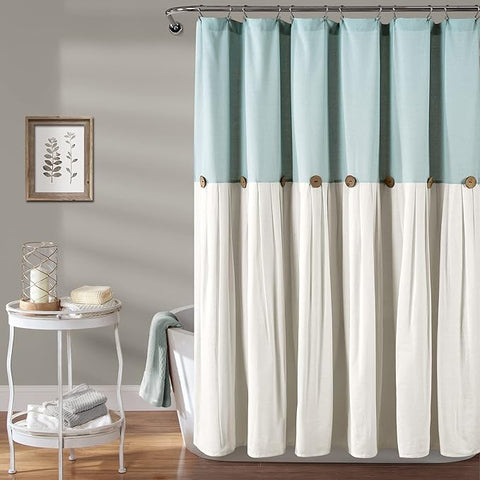 Blue and off-white linen button shower curtain with coconut button detail, adding farmhouse style to the bathroom decor.