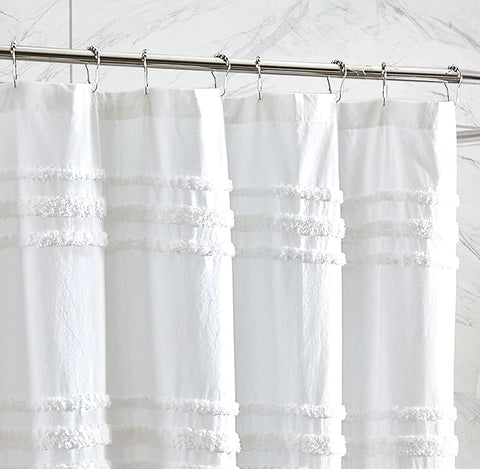 White chenille stripe shower curtain, adding classic elegance to bathroom decor.