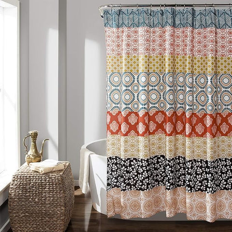 Colorful bohemian stripe shower curtain in turquoise and orange, adding eclectic flair to bathroom decor.