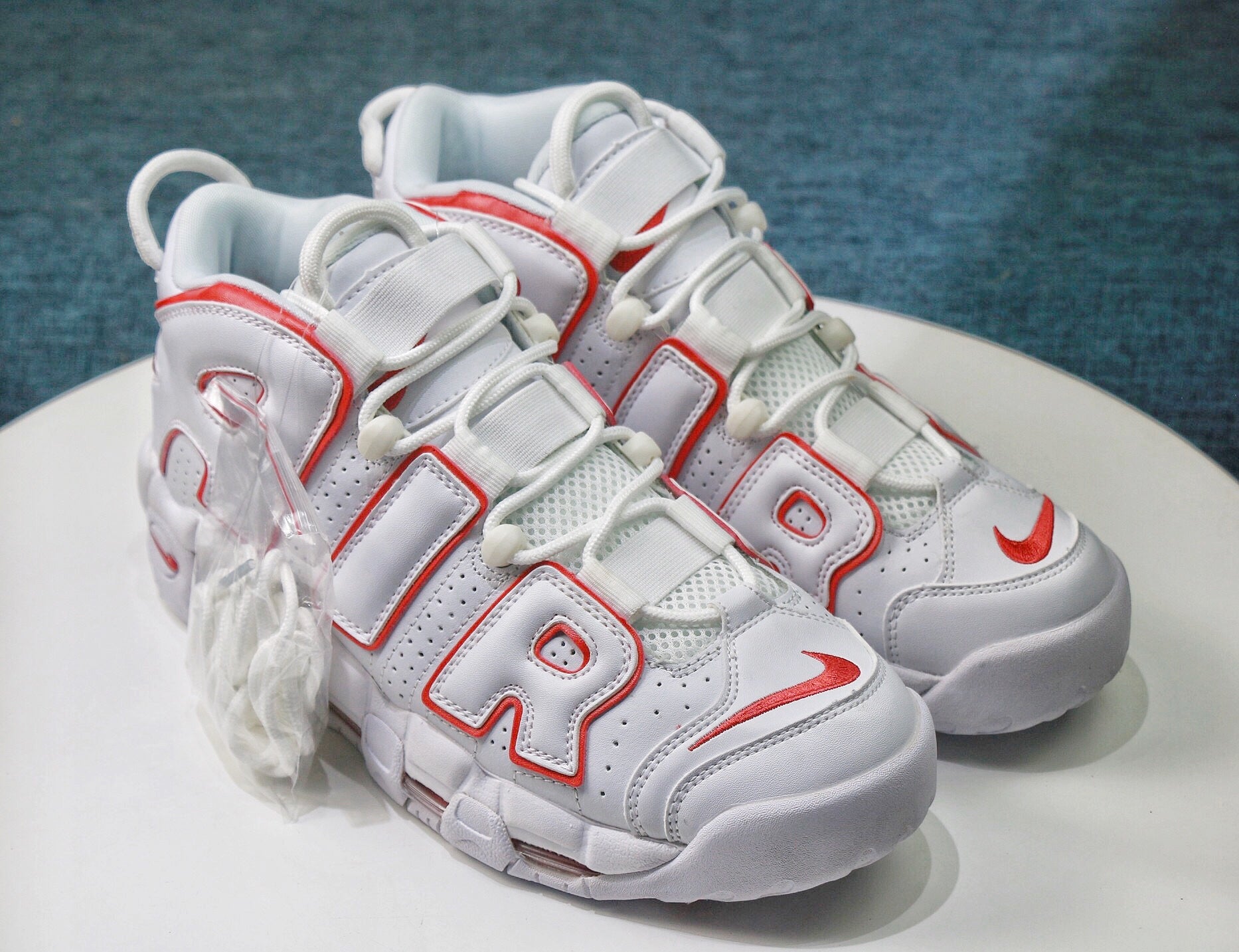 nike air uptempo size 4