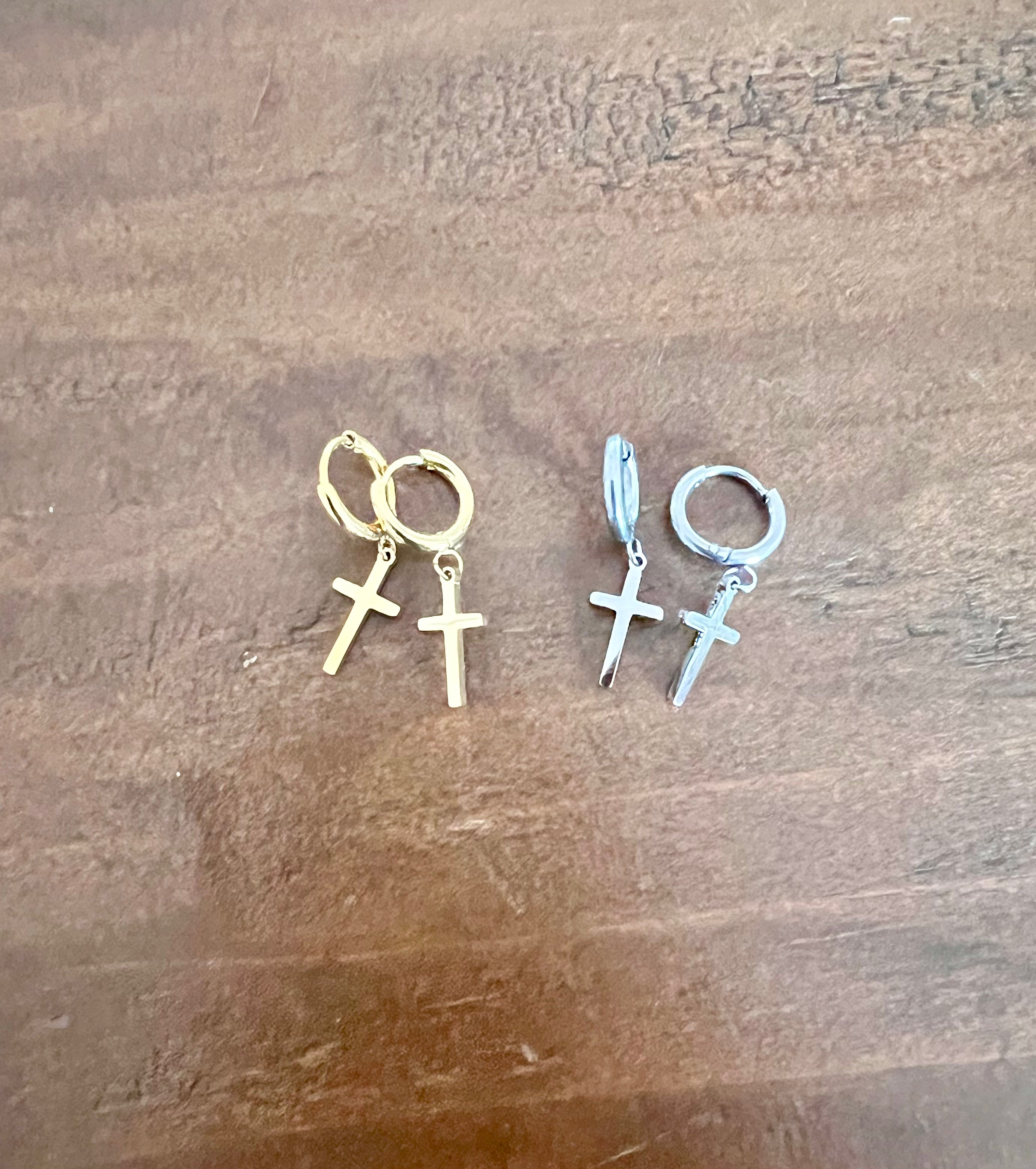 cross huggie earrings