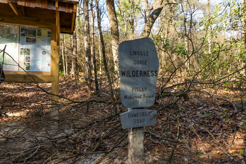 hiking trail sign for hawksbill mountain in linville gorge wilderness