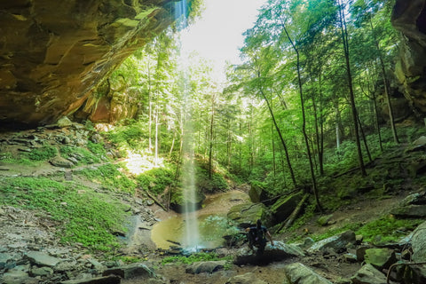 Looking out onto yahoo falls from within rock shelter in big south fork of Kentucky  