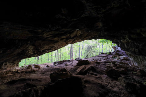 Looking out from within large rock shelter along the bluff trail in DeSoto Falls Picnic Area in northeast Alabama 