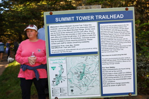 Summit tower trailhead sign in Mount Mitchell state park north carolina