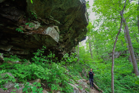 Exploring caves and rock shelters ain’t Denny west trail in Denny cove within south Cumberland State Park in Tennessee 