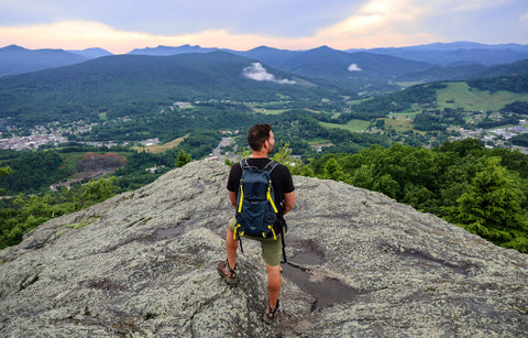 hiker standing on jefferson overlook in mount jefferson state natural area