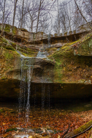 Bowl falls waterfall and rockshelter in yellow birch ravine nature preserve Indiana 