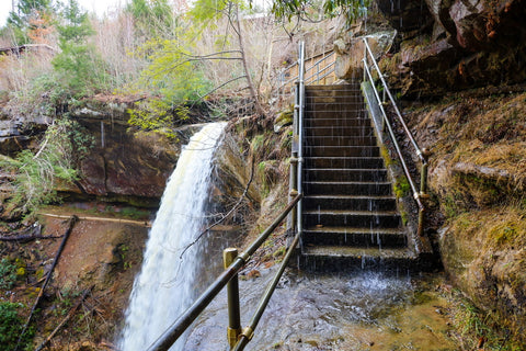 Staircase flooded from waterfall in broke leg falls waterfall scenic area kentucky