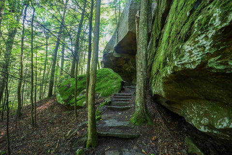 Natural stone tunnel along the hiking trail to yahoo arch in big south fork of Kentucky 