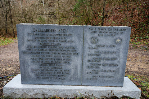 stone marker entailing history of creelsboro natural bridge