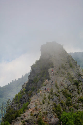 Hikers climbing chimney tops peak in great smoky mountains National park Tennessee 