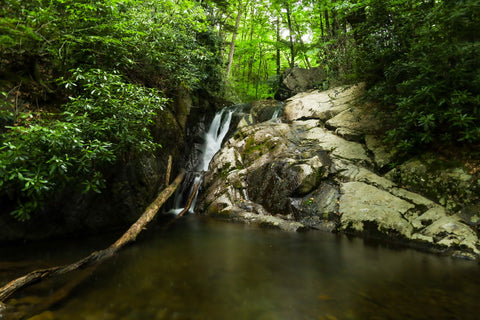 cascading waterfalls along cabin creek trail in grayson highlands state park in virginia