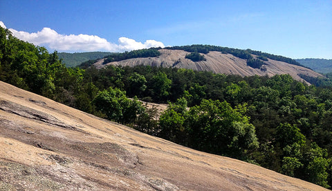 view of stone mountain summit from cedar rock in stone mountain state park