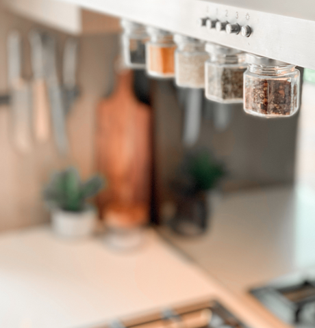 Magnetic spice jars on rangehood