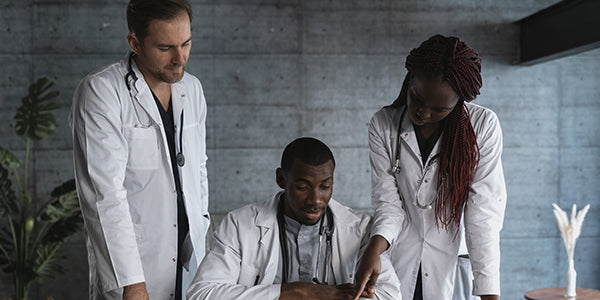 Group of doctors reviewing a file