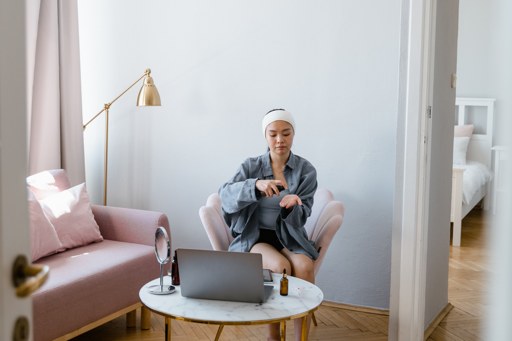 woman practicing self-care while working from home