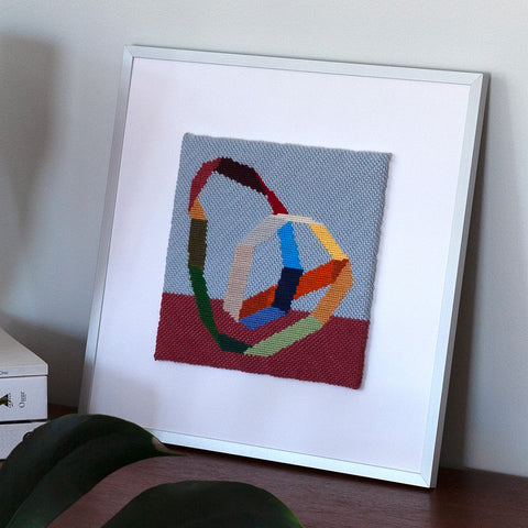 framed needlepoint floating frame with mat