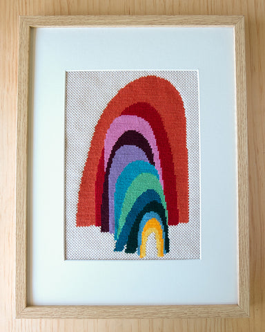 framed needlepoint gallery frame with mat