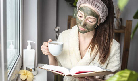 Face covered with Green Tea for making skin smooth and soft