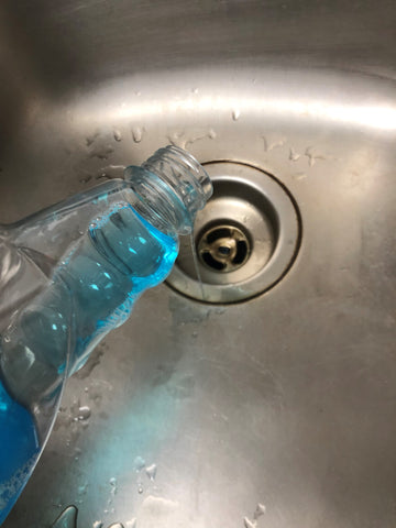 How can I make sure a spray bottle is really clean before reusing it?