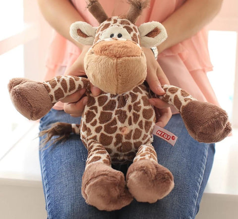 peluche girafe gros yeux